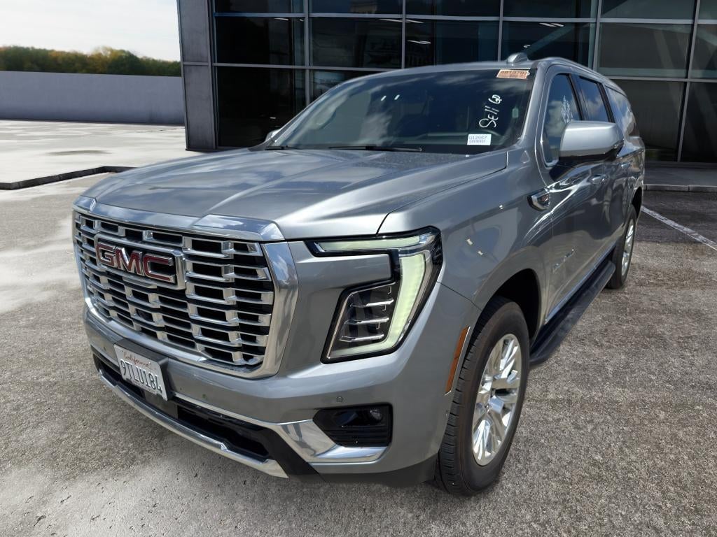 2025 GMC Yukon XL Denali in Sterling Metallic — front three-quarter view